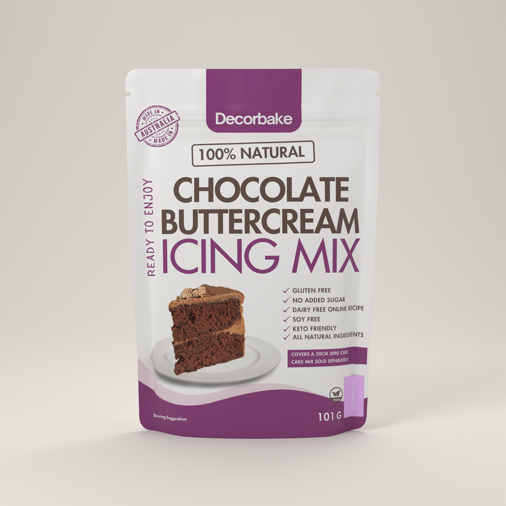 A stand-up pouch of Decorbake Chocolate Buttercream Icing Mix on a light gray studio background. The white and purple package features a photo of a chocolate cake slice and text highlighting natural ingredients and product benefits.