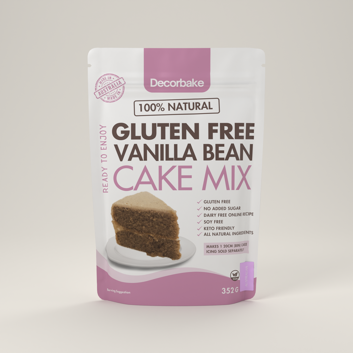 A stand-up pouch of Decorbake Gluten Free Vanilla Bean Cake Mix on a light gray background. The packaging is white with pink accents and features a photo of a vanilla bean cake slice on the front.